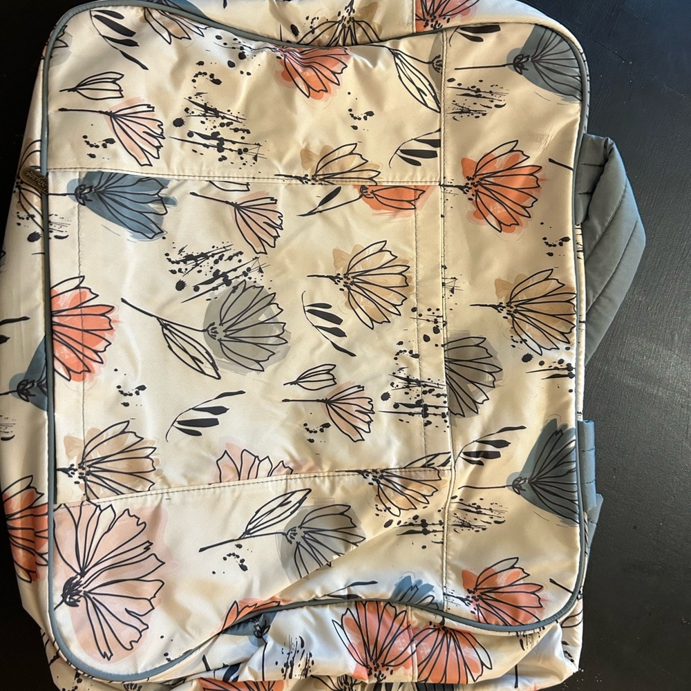 Floral travel bag with blue Accents and zip close bag with outside pockets
